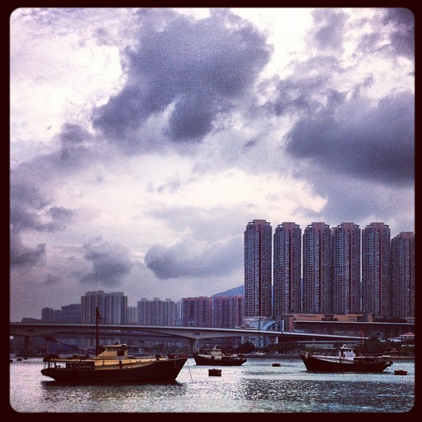 Boats against a cloudy evening sky. #hongkong