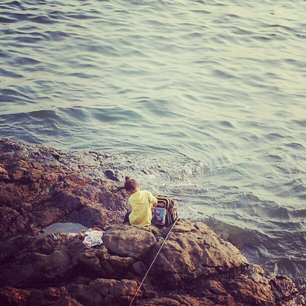 Girl on a rock by the sea. #hongkong