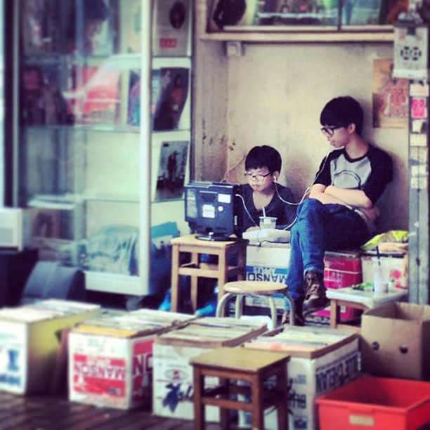 A pair of #youngsters man the #record #stall on the #streets of #shamshuipo #hongkong. #hkig