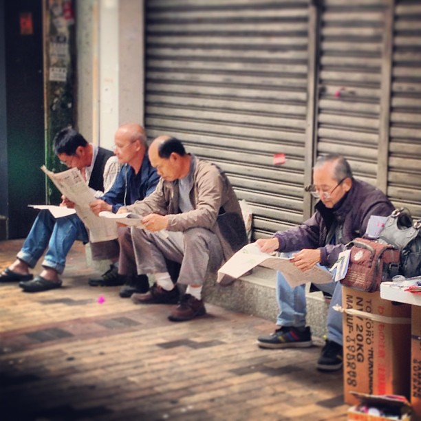 #old #men sitting on the #street checking race results. #hongkong #hkig