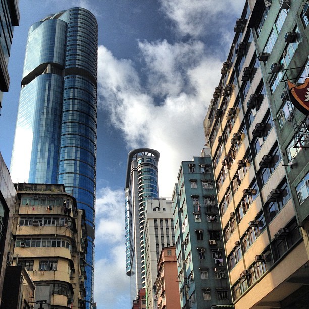 Towers of #glass and #steel loom over the #old #buildings of #mongkok. #hongkong #hk #hkig