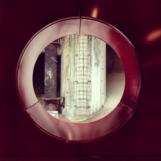#abstract view. #porthole in an #mtr #station that just opens out to a... pillar? Odd. #hongkong #hk #hkig