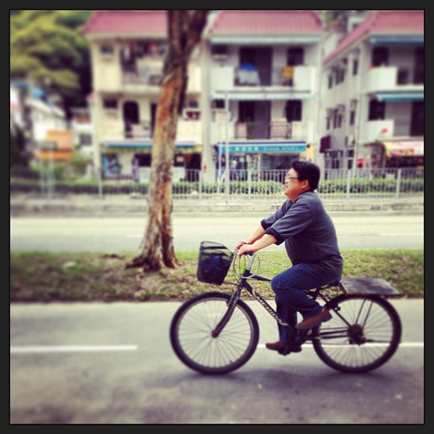 #life is slower in the #newterritories. A #man rides a #bicycle. #hongkong #hkig