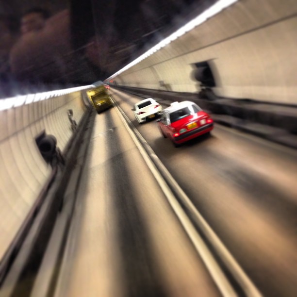 A #taxi zooms past on the #highway in #lionrock #tunnel. #hongkong #hk #hkig