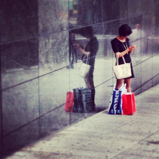 Beside myself - #reflection of a #shopper and #shopping #bags in #tiles. #hk #hongkong #hkig