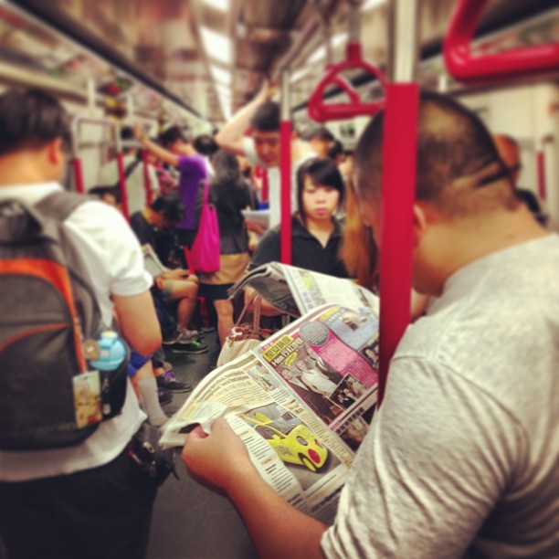 Slice of #life - #reading on the #MTR #train #morning #commute. #hk #hkig