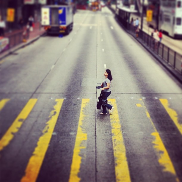#portrait of a person #sprinting across a #zebra #crossing. #hongkong #road #pedestrian #hk #hkig