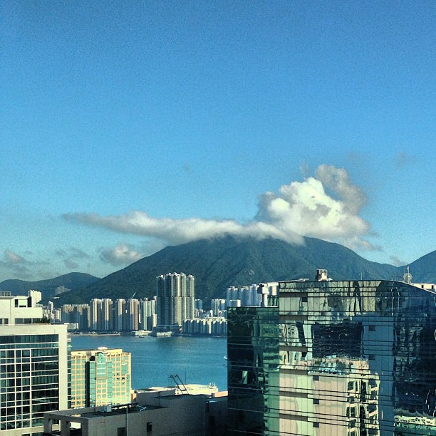 A #cloud settles on a green #hill on #hongkong #island. A lovely #evening. #hk #hkig