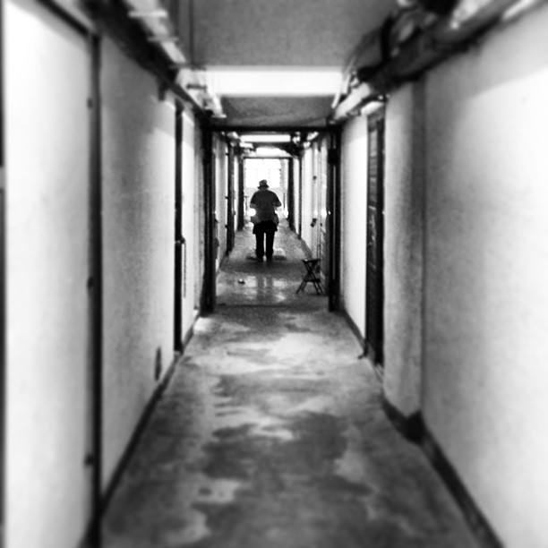 #Silhouette of a man down the #corridor of an #industrial building. #mono #hongkong #hk #hkig