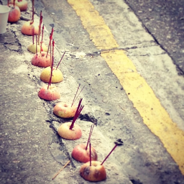 #apples and #incense on the roadside for hungry spirits. #hongkong #hk #hkig