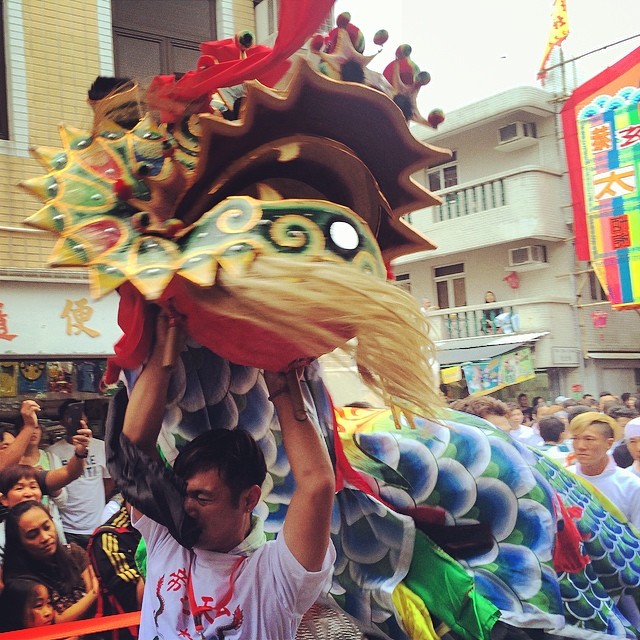 The #ChiLin / #Qilin in action at the #PiuSik #parade at the #cheungchau #bunfestival. Swinging that head around looks tiring! #hongkong #hk #hkig