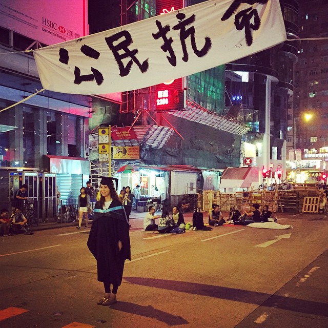 Congratulations on your #graduation! - I have no idea why this #graduate wants to have her photo taken at the #OccupyHK #Mongkok site but... congrats anyway! #HongKong #hk #hkig