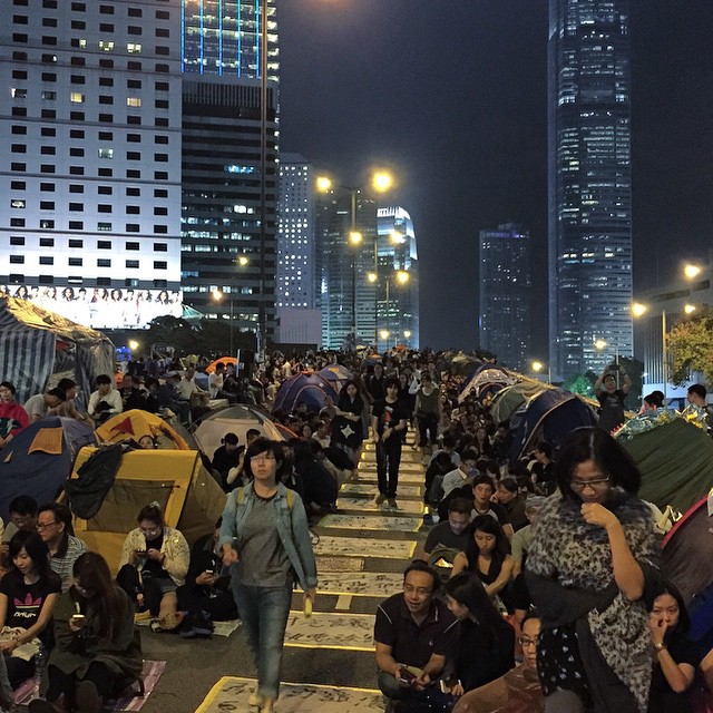Last night at the #OccupyHK rally in #Admiralty - even though #HarcourtRoad was packed with #protesters, there were clearly defined paths through the crowd. Here the path is paved with protest slogans. #HongKong #hk #hkig