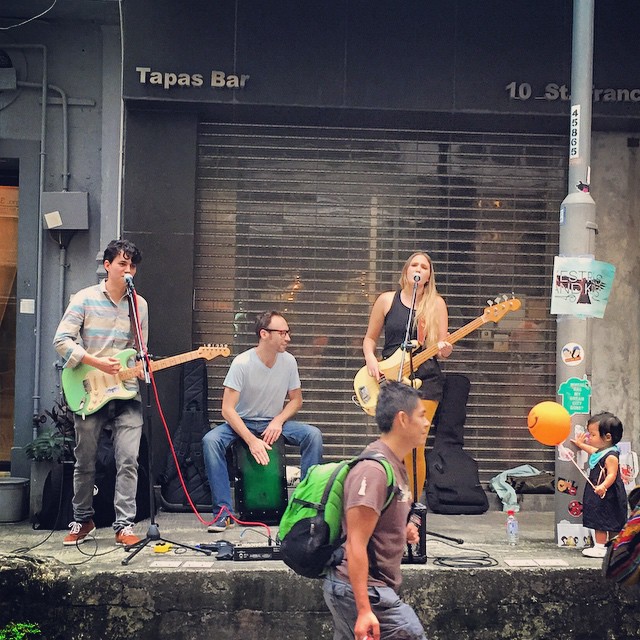 Meanwhile, not even 1km away from the OccupyHK protest site, the ultra hip #StarStreet neighbourhood is having a #streetparty. Indie #hipster band #KestrelsAndKites are currently playing. #HongKong #hk #hkig