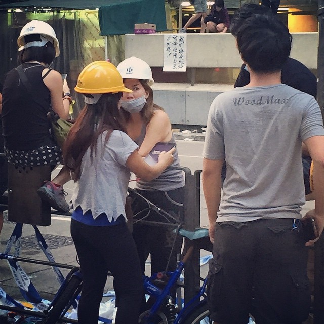 Not #construction workers, these ladies are espousing the latest in #OccupyHK protest wear, the #hardhat. #HongKong #hk #hkig