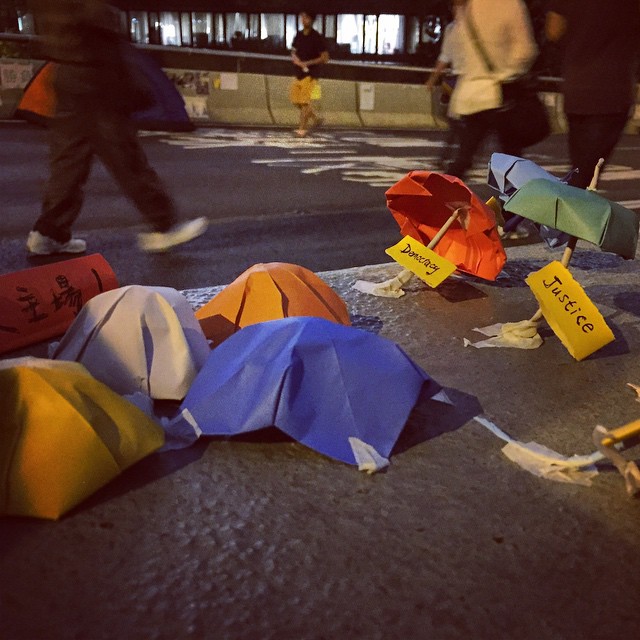 On the highway divider on #HarcourtRoad, a #diorama has appeared depicting the #OccupyHK #Admiralty protest camp. Neat little #tents and #umbrellas. #HongKong #hk #hkig