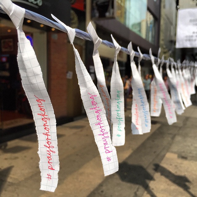 Strips of paper with #prayforhongkong written on them, strung up along #CausewayBay. #OccupyHK #HongKong #hk #hkig