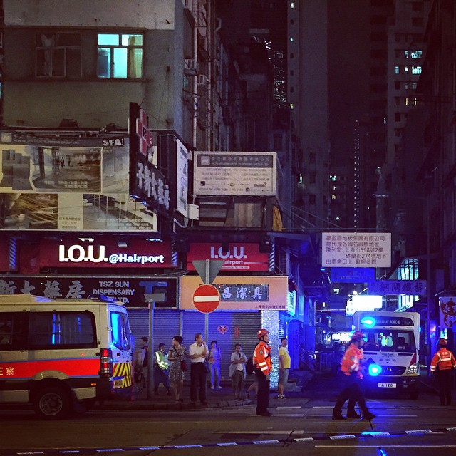 #ambulance and #police personnel standby on a side street while the former #OccupyHK #Mongkok area descends into chaos. #HongKong #hk #hkig