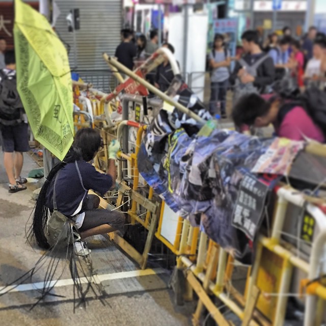 #barricade builder - the #barriers at the #OccupyHK site on #NathanRoad in #Mongkok is maintained / strengthen by volunteers. #HongKong #hk #hkig