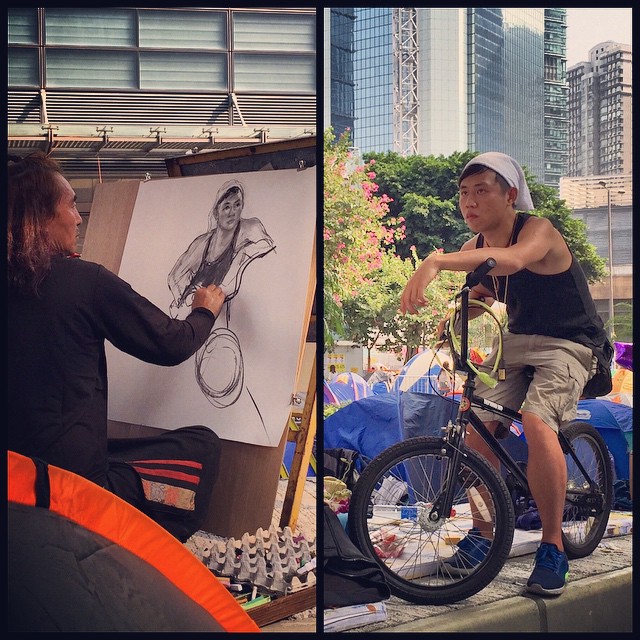 At #OccupyHK #Admiralty art is abundant. Here we see the #portrait #artist at work and the subject, seated on his #bicycle. Pretty good likeness don't you think? #HongKong #hk #hkig