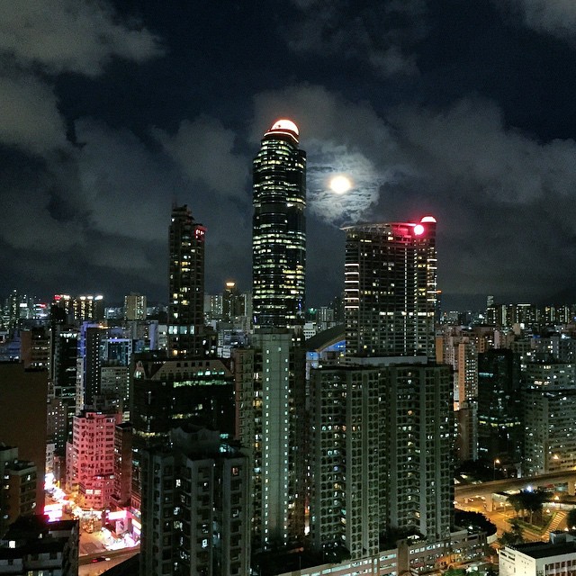 #moon over #Mongkok - walked into my apartment to the beautiful sight of #clouds drifting past the moon rising behind #LanghamPlace in #Kowloon. Breathtakingly beautiful, this pic can't do it justice. #HongKong #hk #hkig