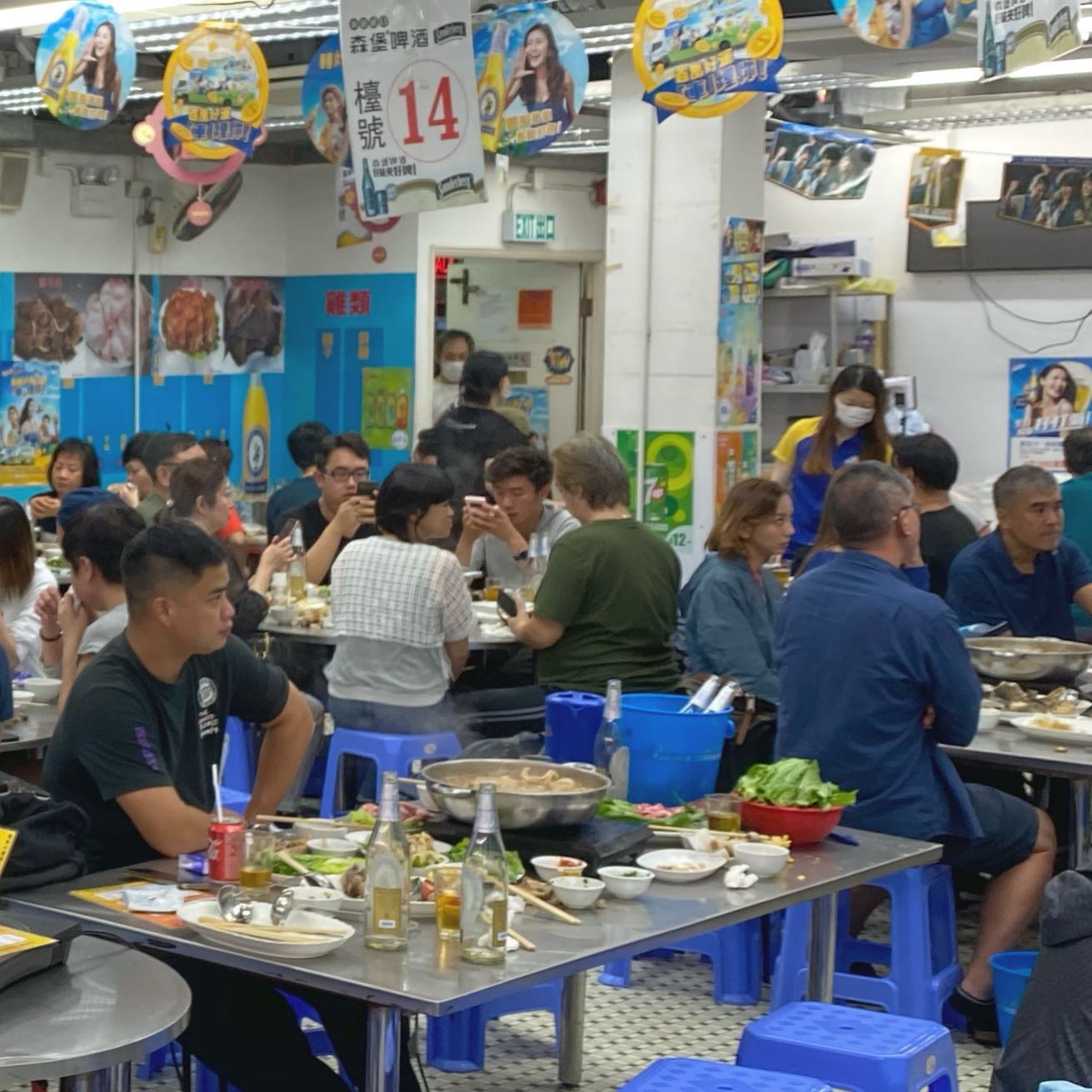 An oldschool hotpot restaurant in TaiKokTsui HongKong. Check out the old school tiles on the floor and the abundance of BlueGirl posters. hk hkig