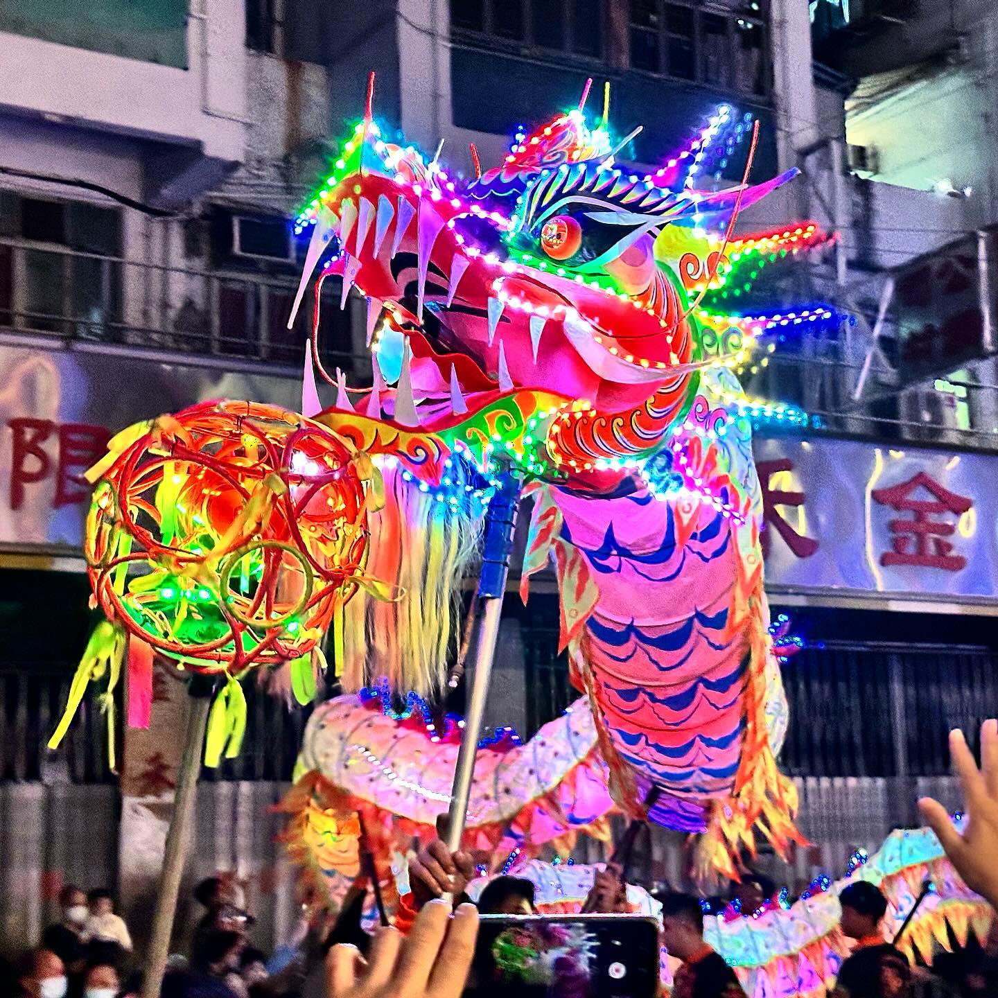 The TaiKokTsuiTempleFair retuned after years of absence due to COVID. A LED Dragon, dragondance through the streets of TaiKokTsui, kowloon. hongkong hk hkig