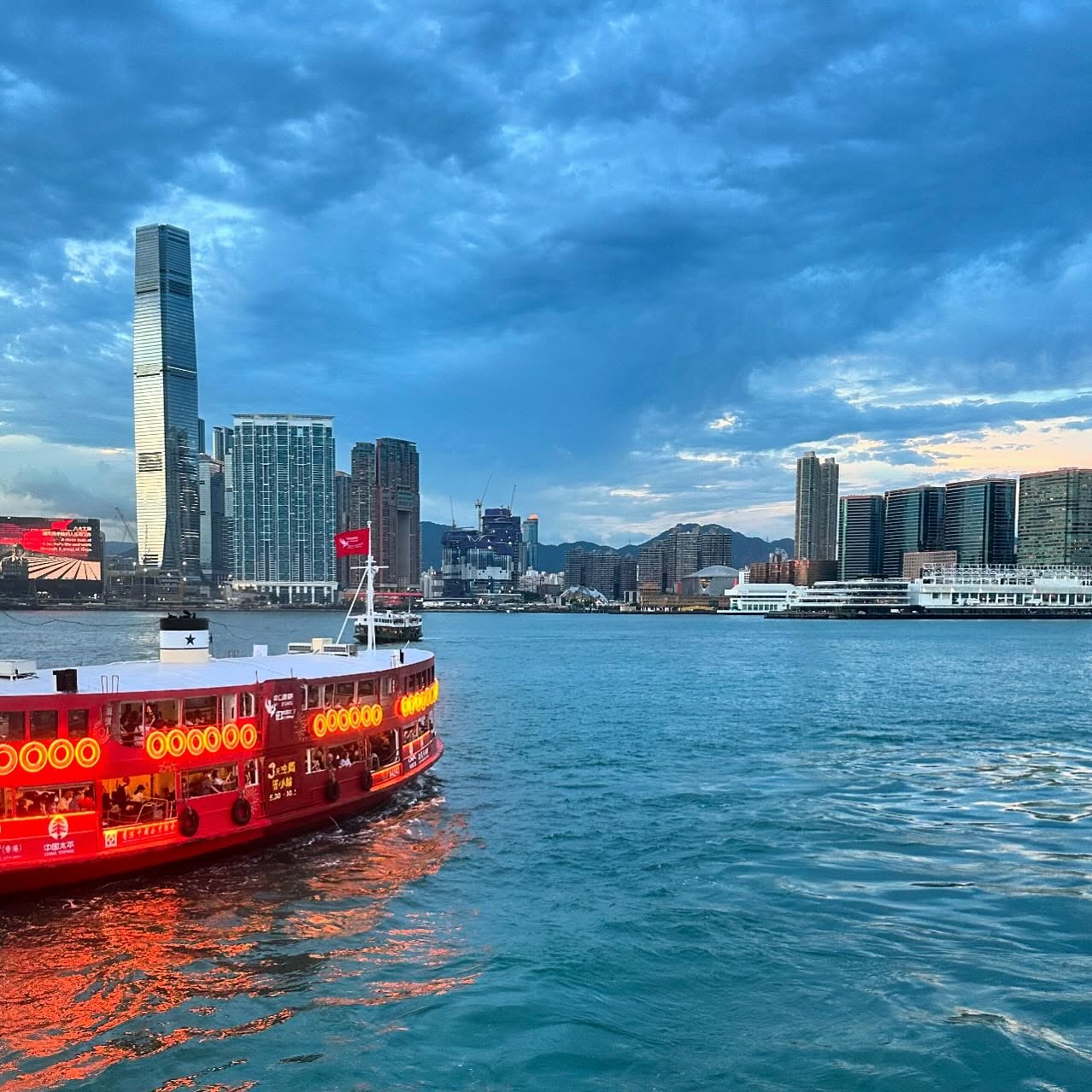 The HongKong StarFerry sails across VictoriaHarbour to Kowloon in the evening. hk hkig ferry