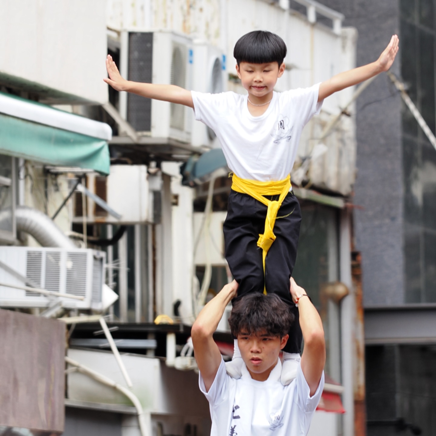 Acrobatics at the Tam Kung Birthday Parade in Shau Kei Wan. hongkong hk hkig shaukeiwan tamkung