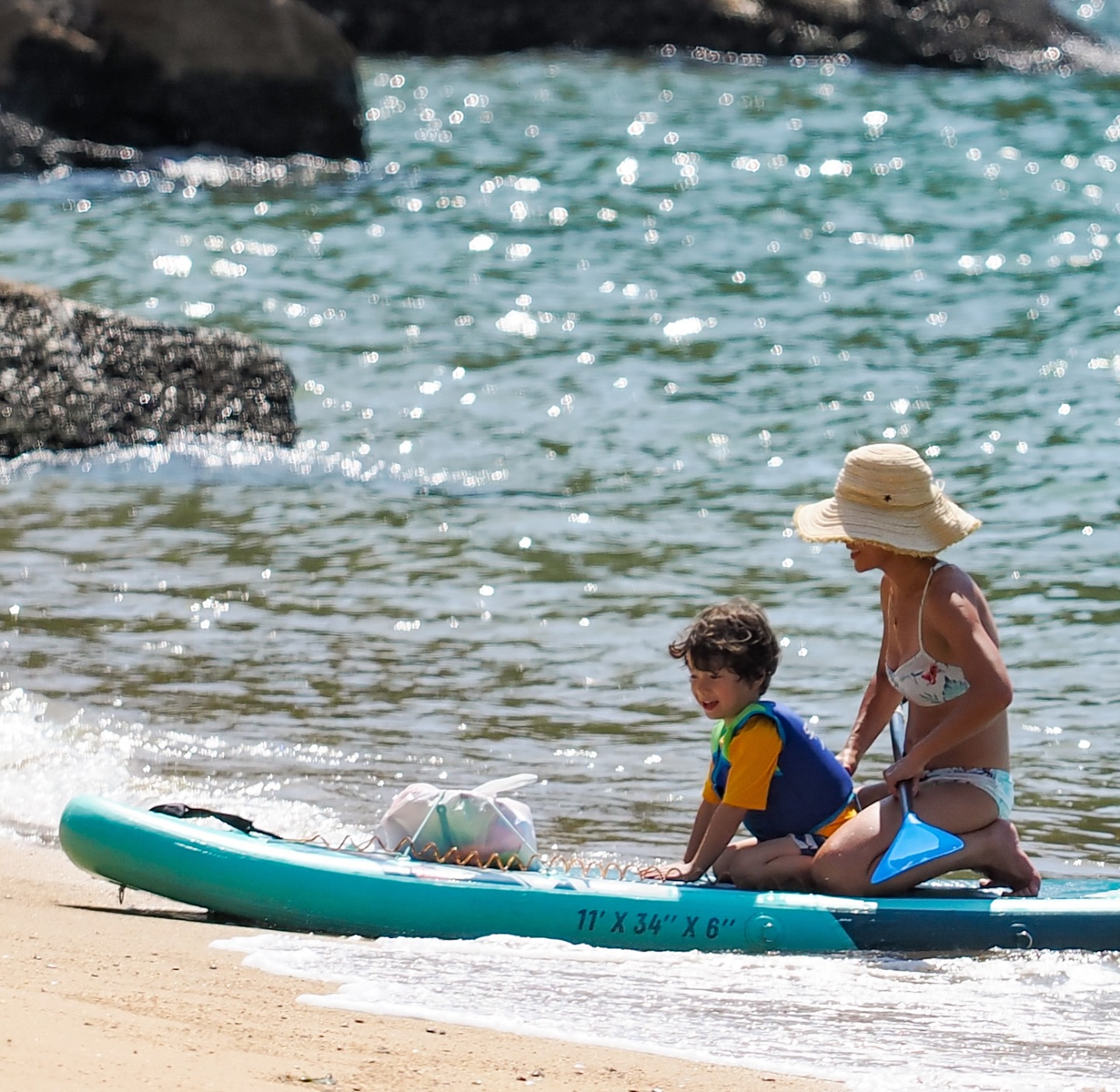 Mother and child paddle boarding. hongkong hk hkig summer sea paddleboarding