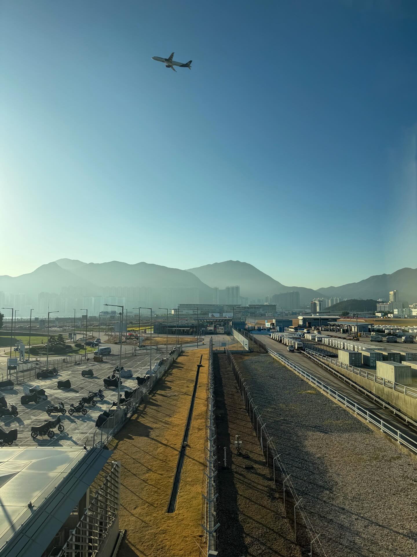 A plane takes off at the Hong Kong International Airport. hongkong hkig hkia airplane airport